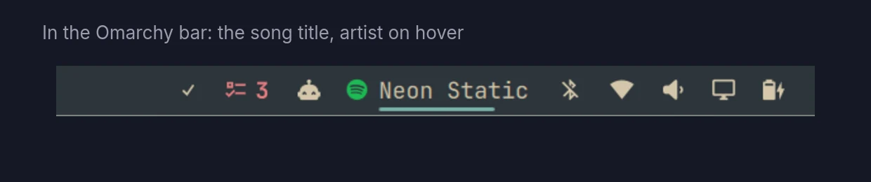 In the Omarchy bar: the song title sits beside the other widgets, and hovering it shows the artist